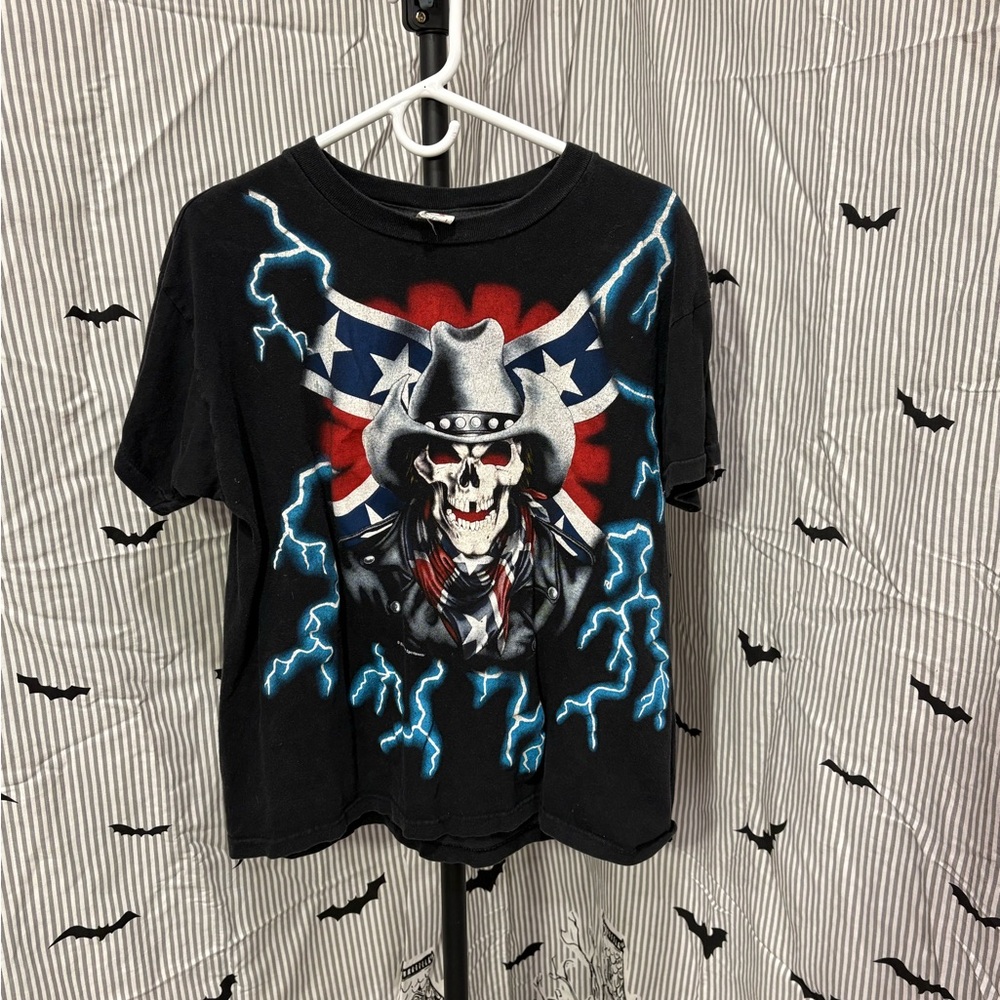 ITEM#63 Skeleton with Cowboy Hat & Flag Wrapping - Black Shirt - L

21x25